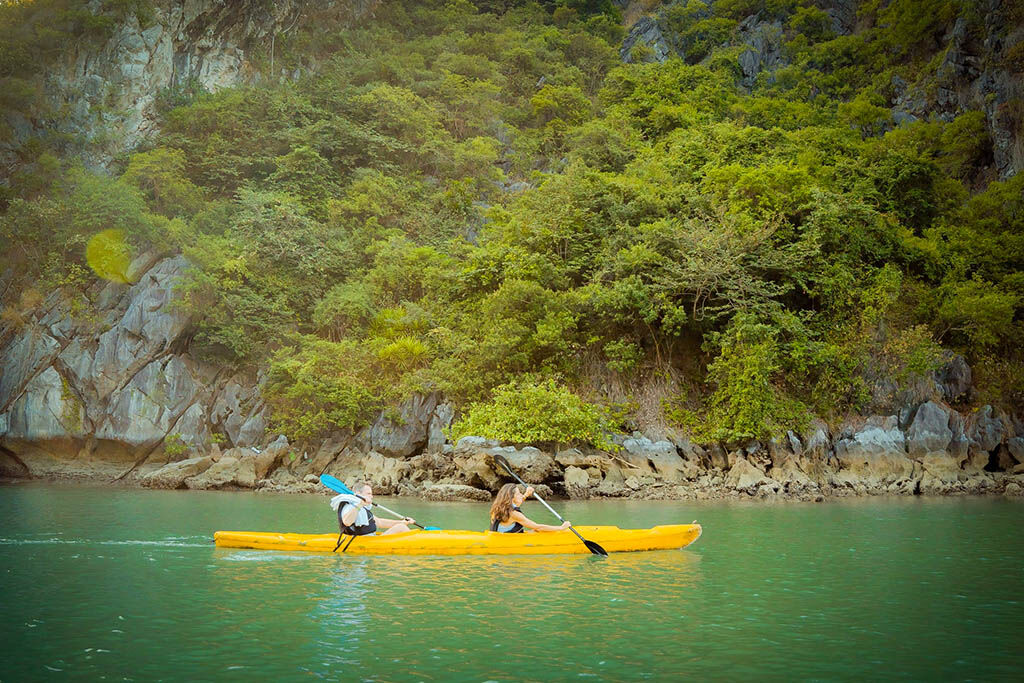 Paddle through serene Halong Bay waters