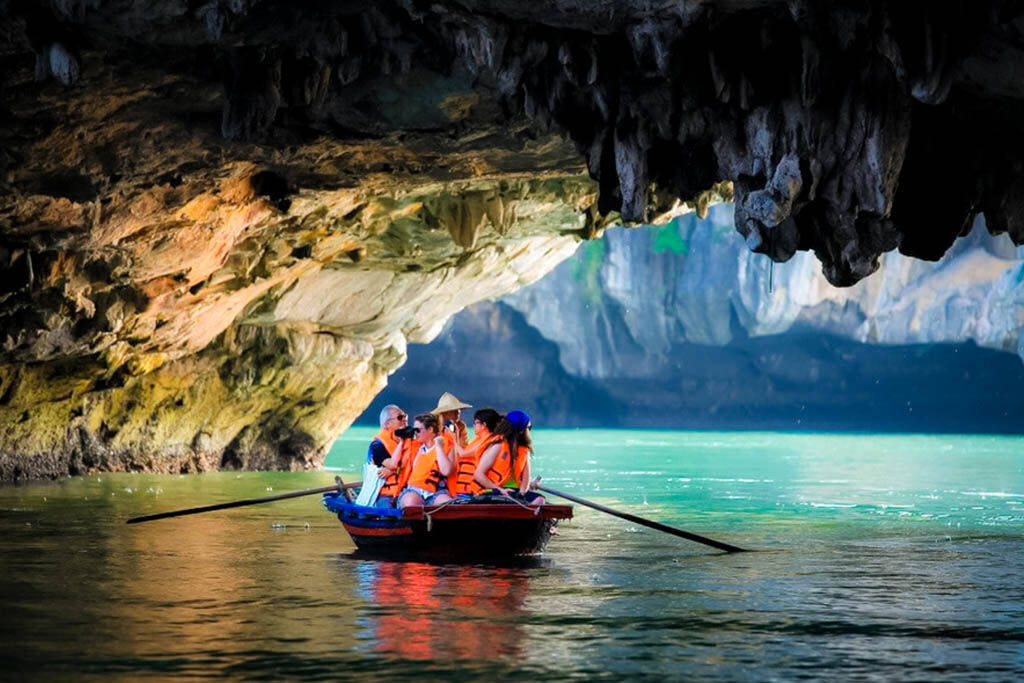 Explore hidden lagoons by bamboo boat