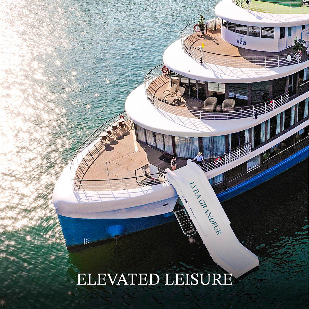 Sail among the emerald waters and iconic peaks of Halong Bay