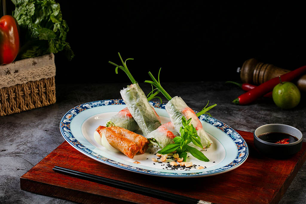 Savor gourmet dining while anchored among Halong Bay’s islands