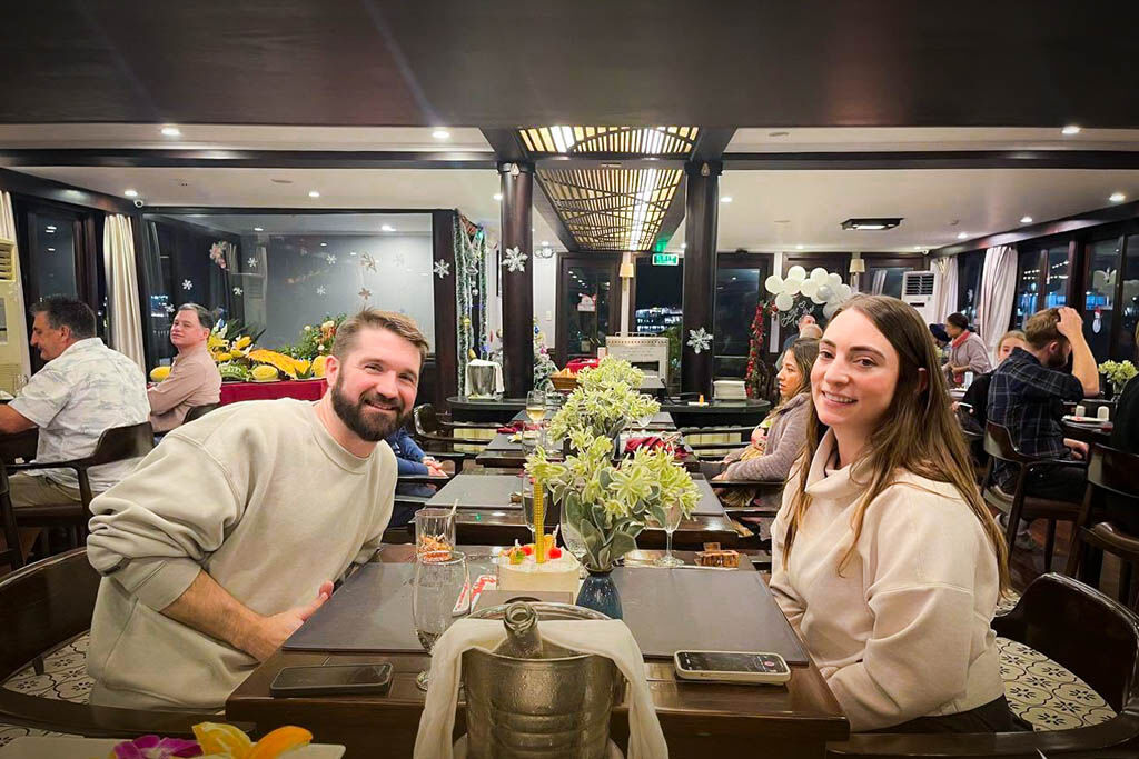Smiling together on a luxury Halong Bay cruise