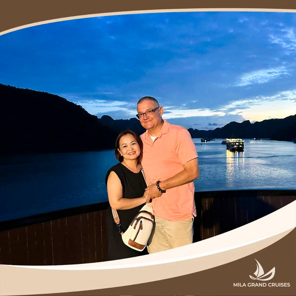 Smiling together on a luxury Halong Bay cruise