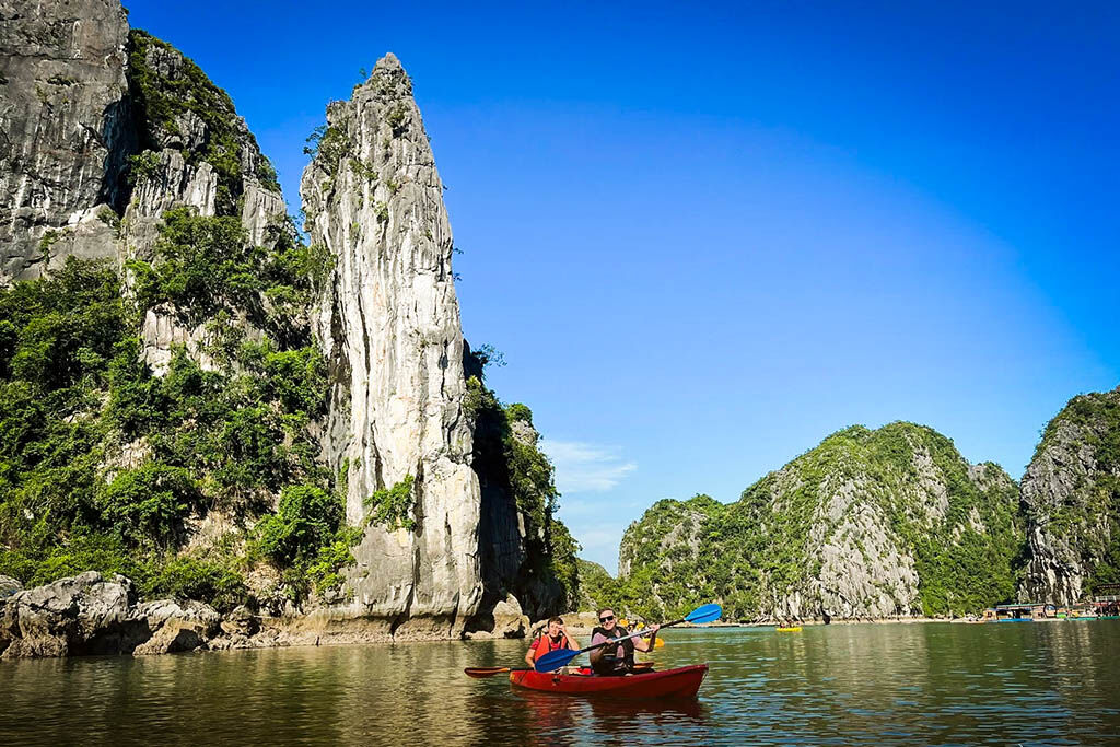 Glide through emerald waters and karst landscapes