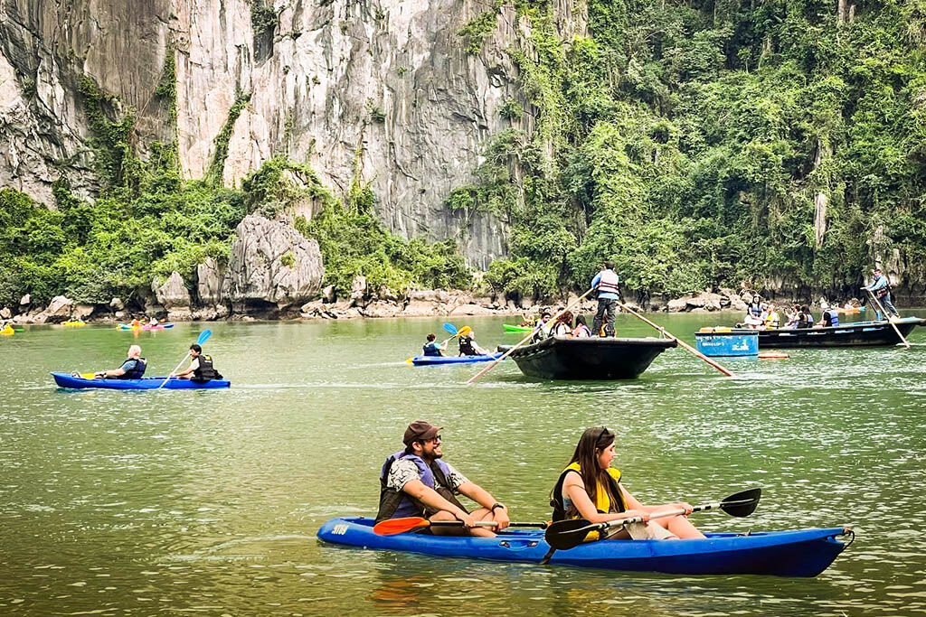 Explore calm emerald waters at your own pace by kayak