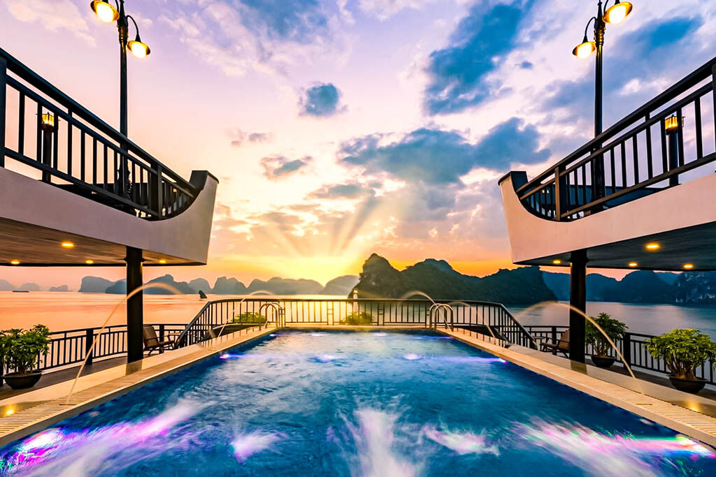 Enjoy poolside luxury with Halong Bay views