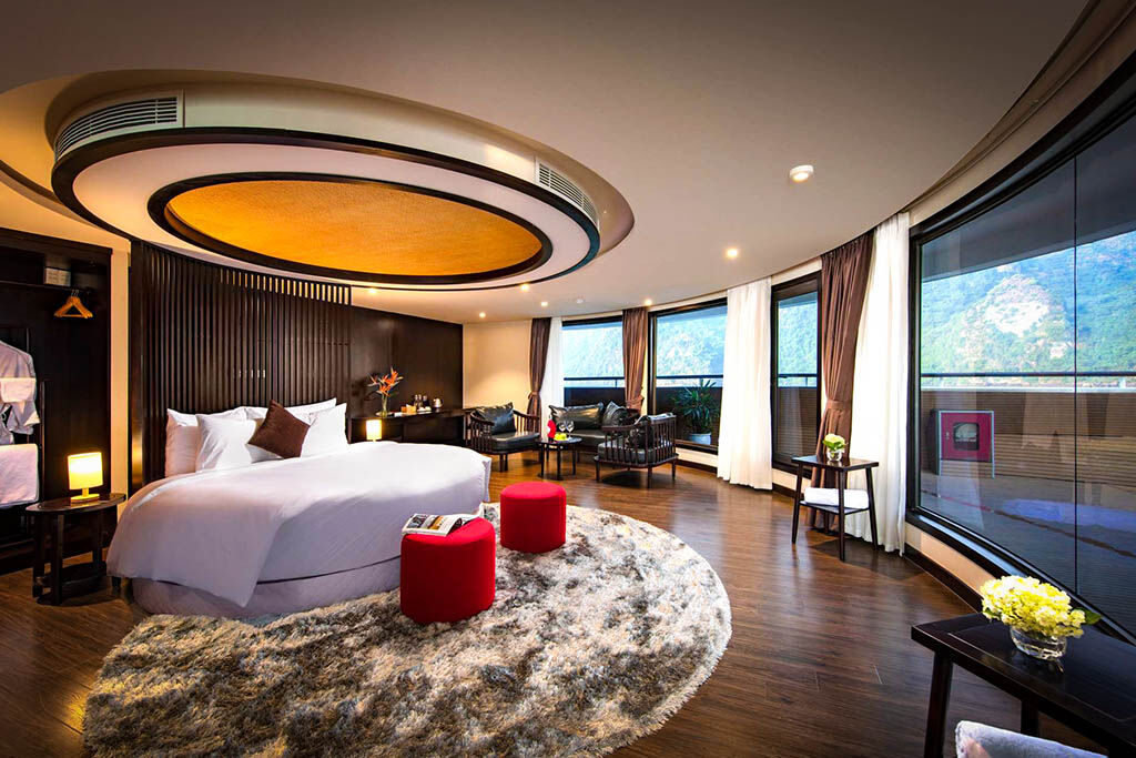 Wake up to panoramic bay views from your elegant cabin aboard
