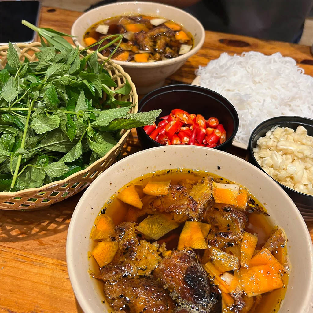 Savor delicious local pho and street delicacies