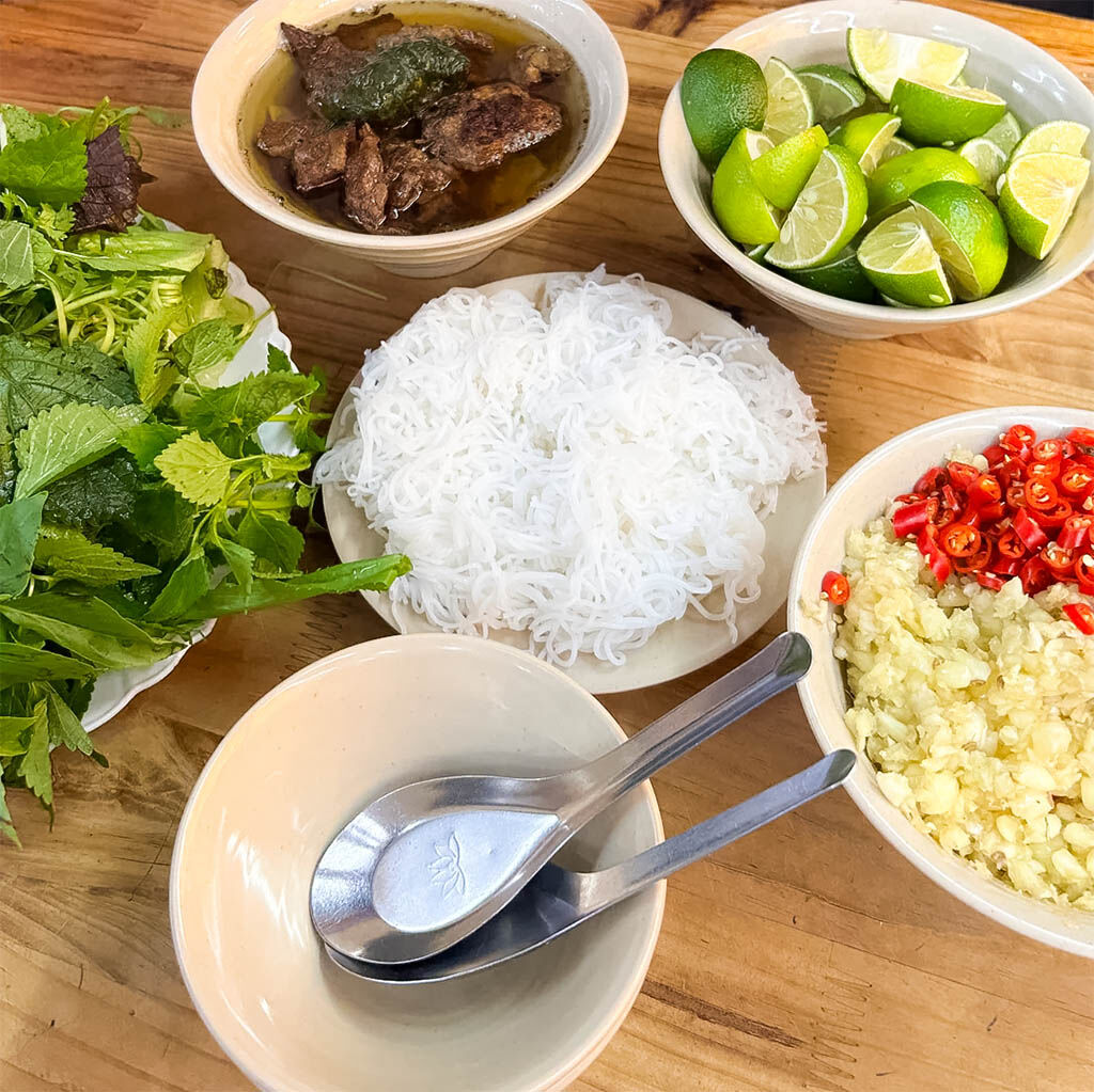 Savor authentic pho and local delicacies on the streets