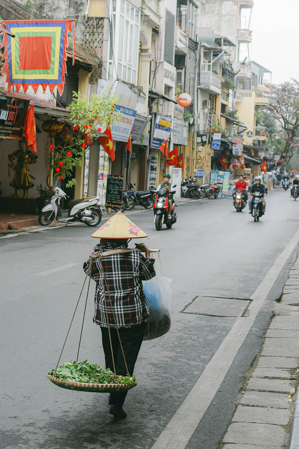 Immerse yourself in the vibrant energy of Hanoi’s ancient streets