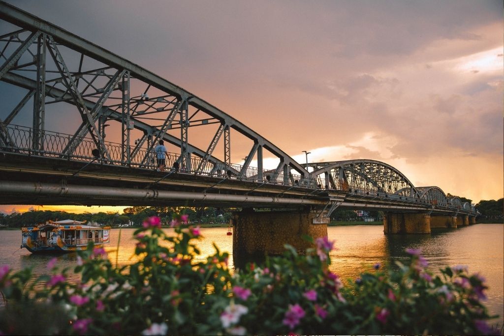 Capture the authentic charm of Hue’s riverside scene