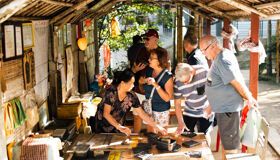 Tourists at traditional house in Hue City
