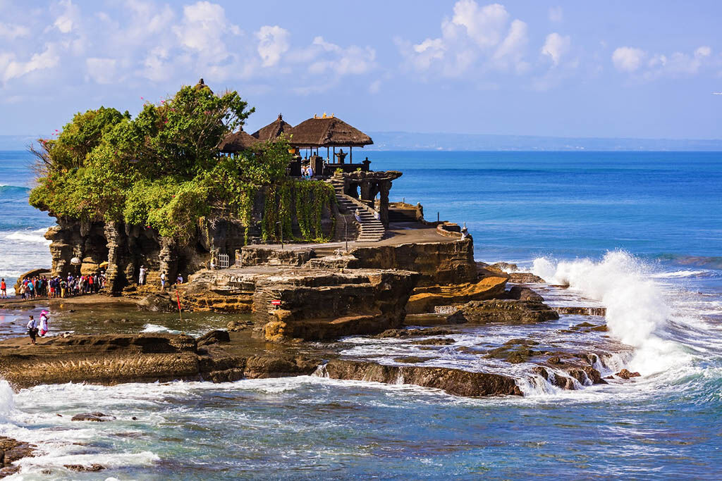 Witness the magical sea temple against a golden sky