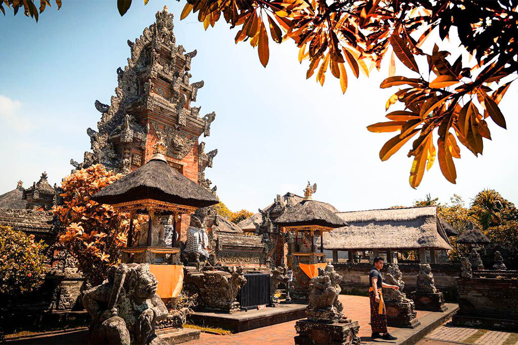Witness the magical sea temple against a golden sky