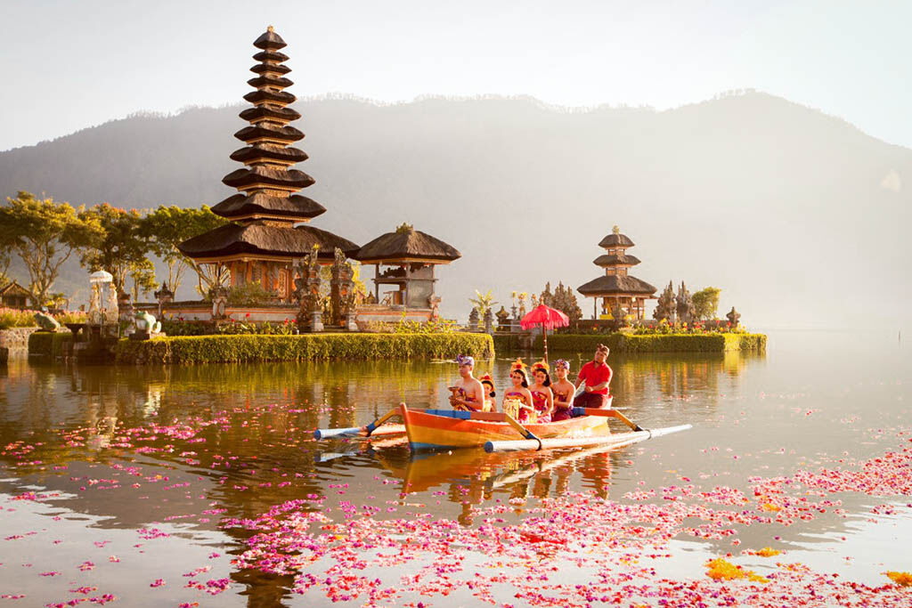 Witness the magical sea temple glowing against the ocean