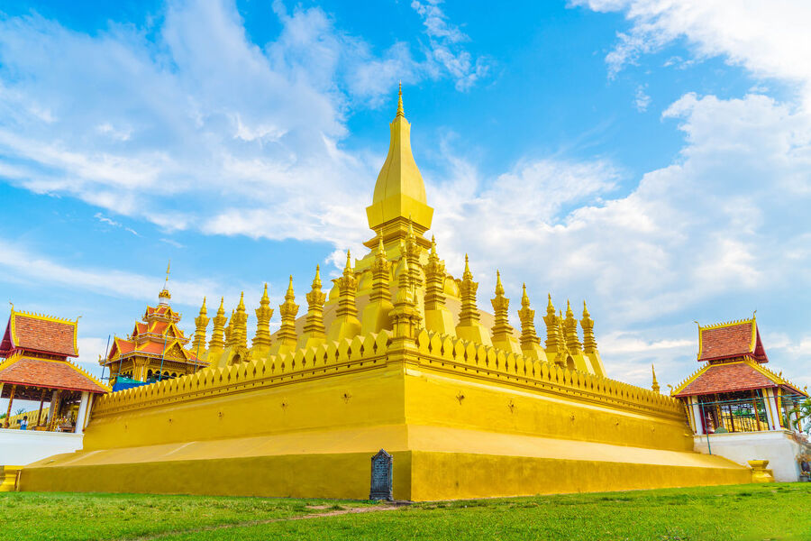 Marvel at Laos’s iconic national symbol glowing in the sun