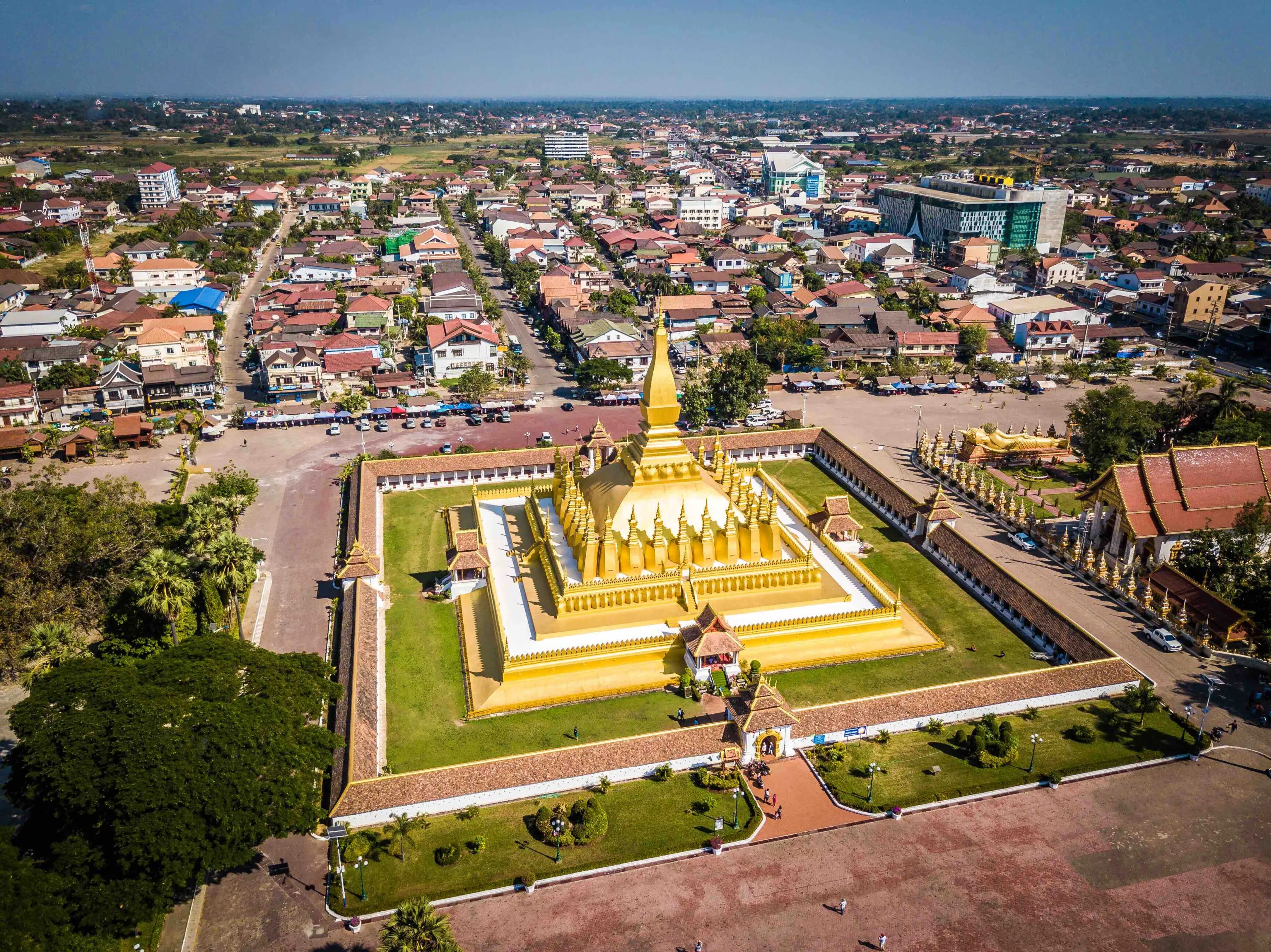 Marvel at Laos’s iconic national symbol glowing at sunset