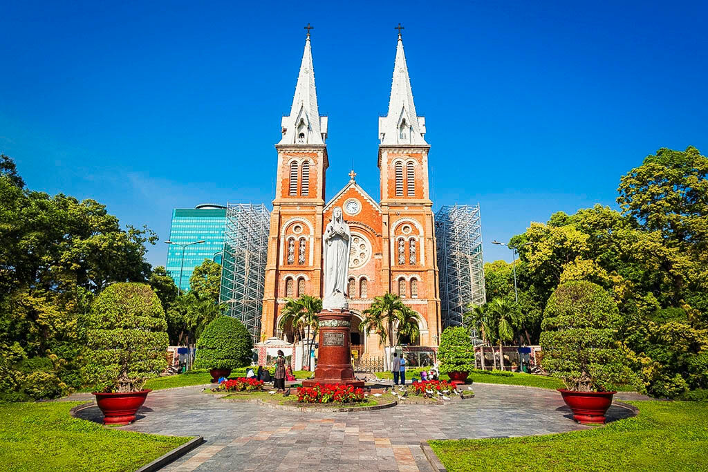 Admire the illuminated French colonial beauty of Saigon’s landmark cathedral