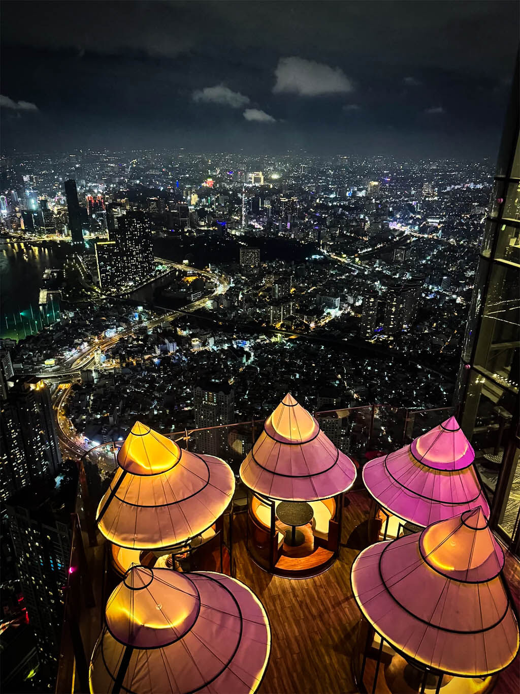 Experience the vibrant energy of modern Saigon by night