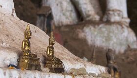 Statues in Pak Ou Cave Laos
