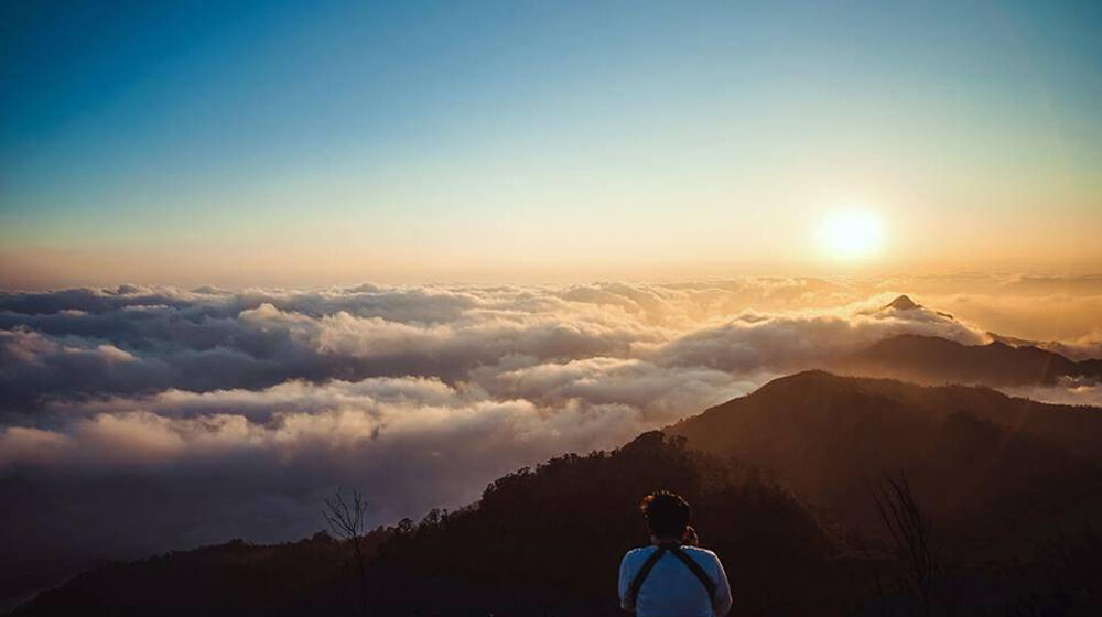 Tay Con Linh Peak - Start your journey with Ha Giang’s rugged glow