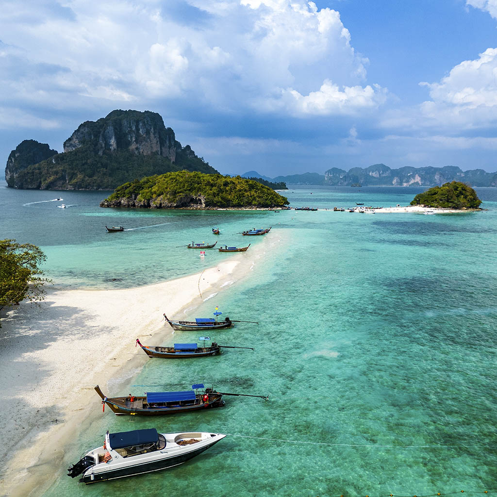 Discover dramatic limestone cliffs and turquoise waters