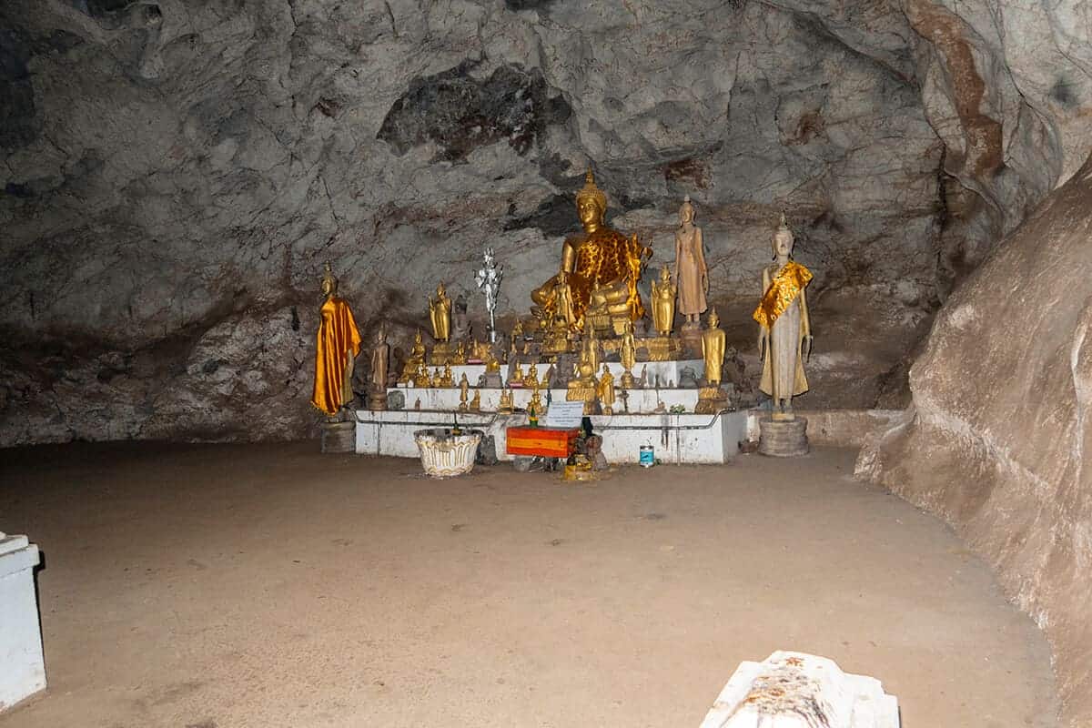 Explore sacred caves filled with thousands of Buddha images