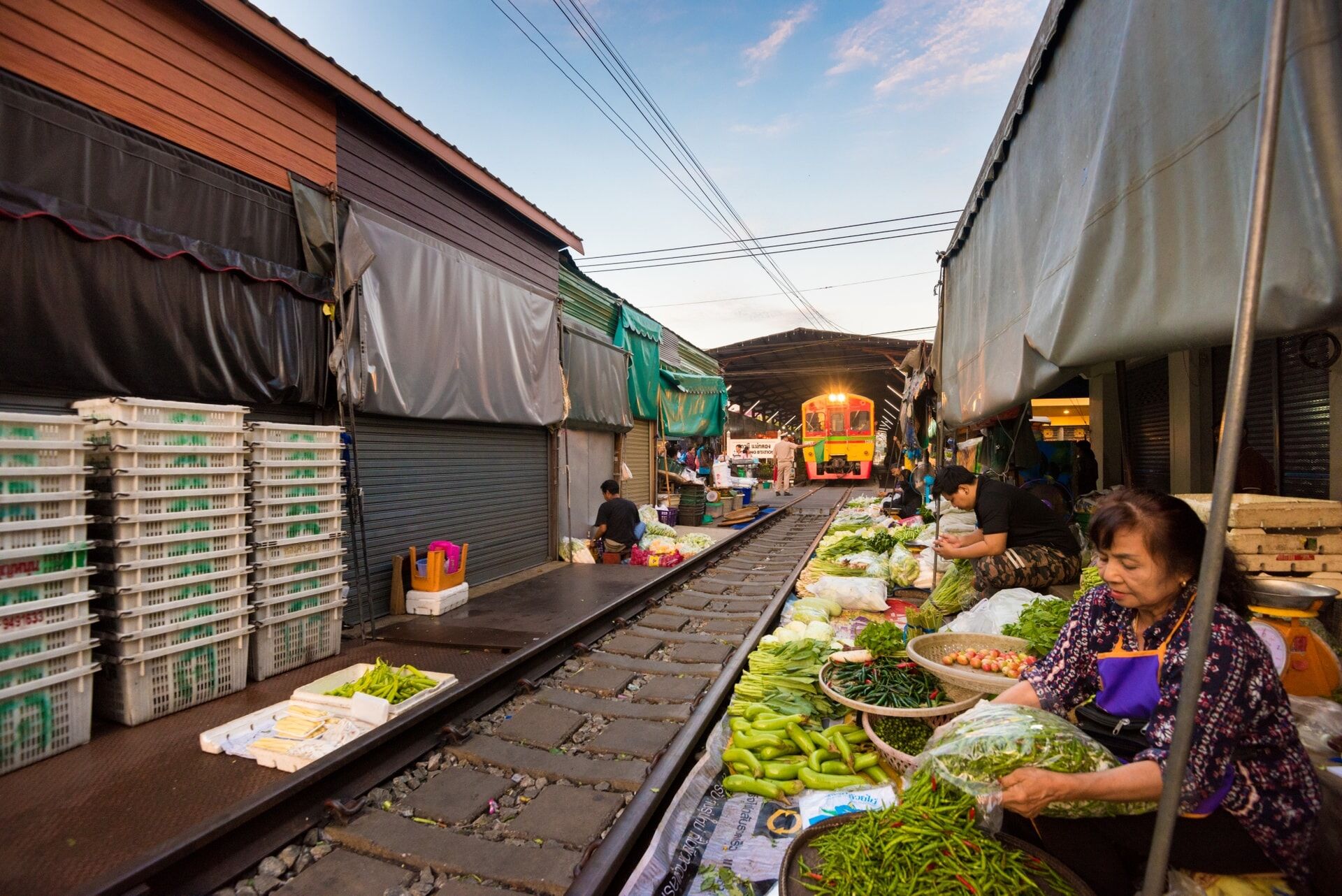 Start your journey with Mae Klong’s bustling glow