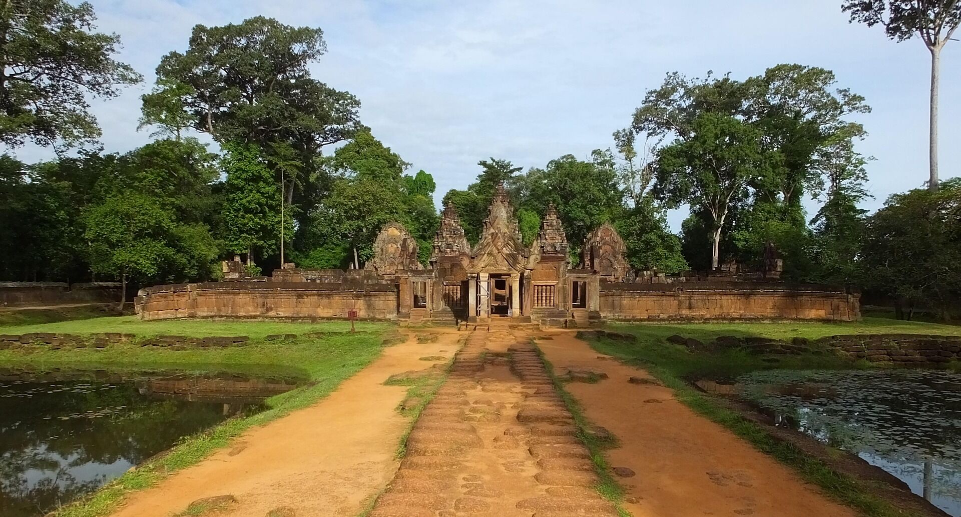 Witness the majestic Angkor Wat glowing at dawn