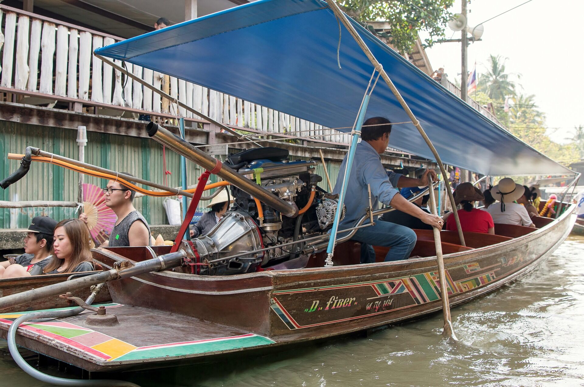 Capture the authentic charm of Thai riverside life