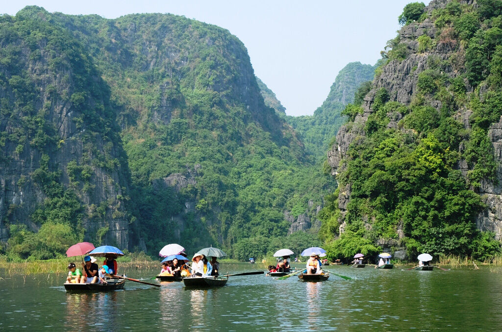 Discover dramatic limestone mountains and rivers near Hanoi