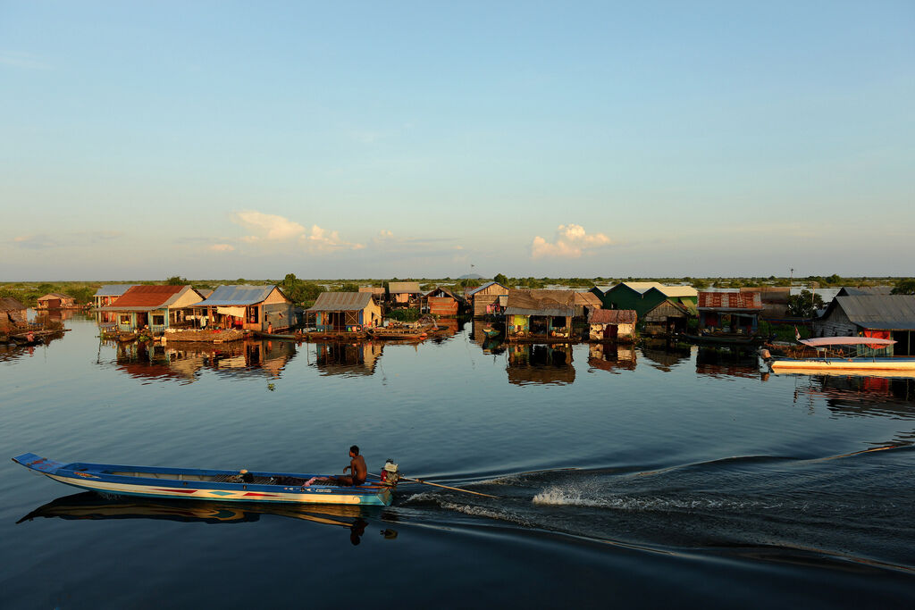 Capture the authentic charm of Tonle Sap’s village scene