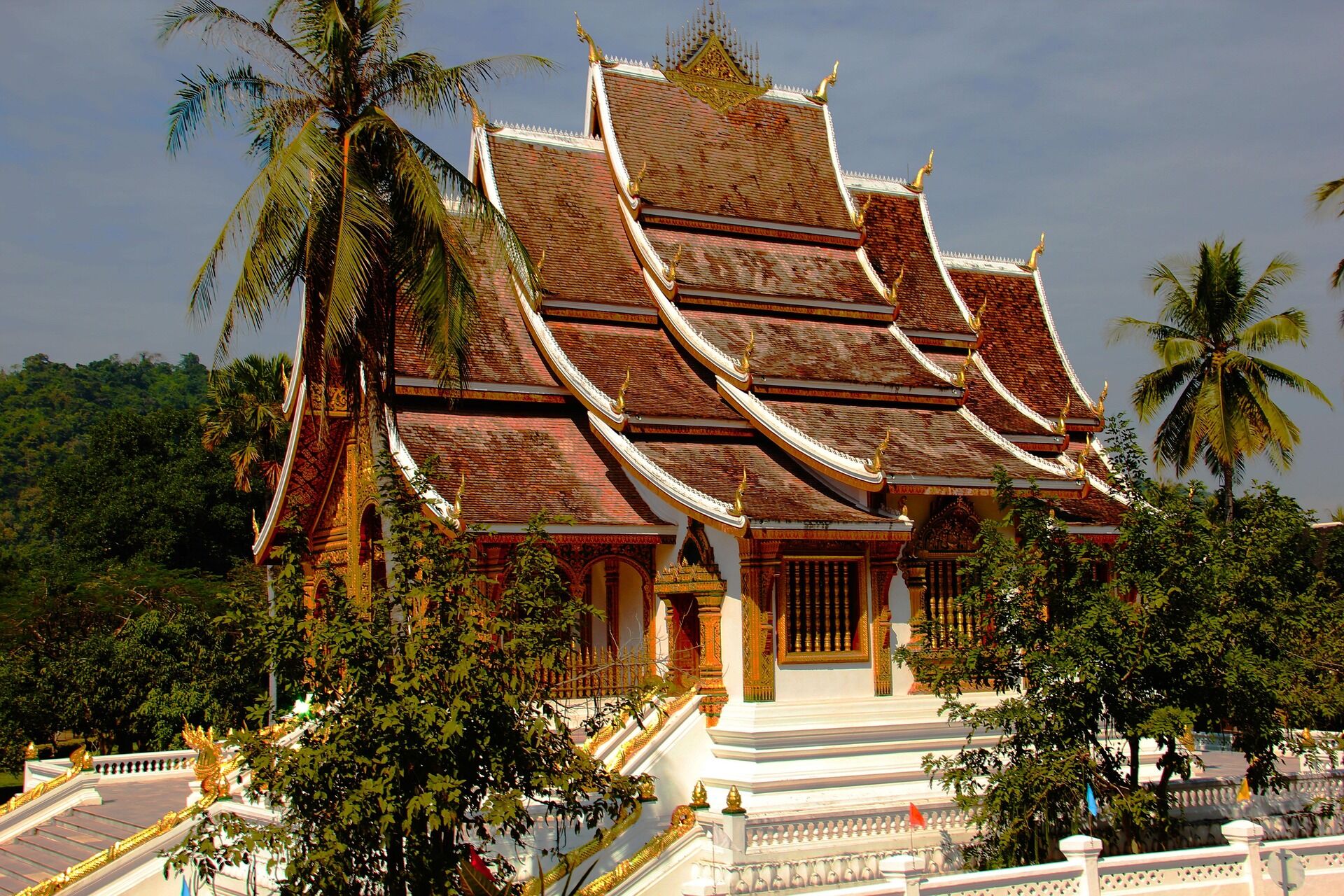 Admire the intricate golden artistry of Laos’s most sacred temple